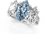 White gold Fancy Blue Marquise Cut Diamond Three-Stone Ring with Channel Set Band and Four-Prong Setting_65