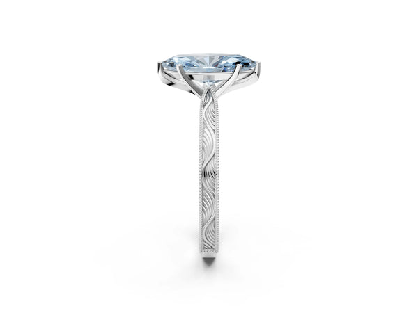 White gold Fancy Blue Marquise Cut Solitaire Milgrain Engraved Band with Four-Prong Setting
