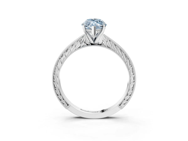 White gold Fancy Blue Marquise Cut Solitaire Milgrain Engraved Band with Four-Prong Setting