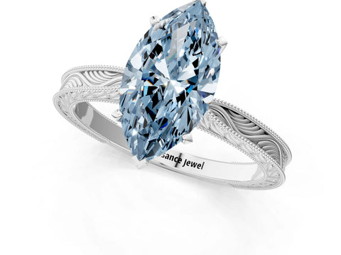 White gold Fancy Blue Marquise Cut Solitaire Milgrain Engraved Band with Four-Prong Setting_1