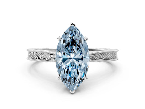 White gold Fancy Blue Marquise Cut Solitaire Milgrain Engraved Band with Four-Prong Setting