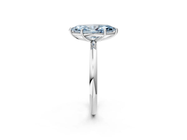 White gold Fancy Blue Marquise  Solitaire Diamond Ring with Four-Prong Setting on a Plain Band