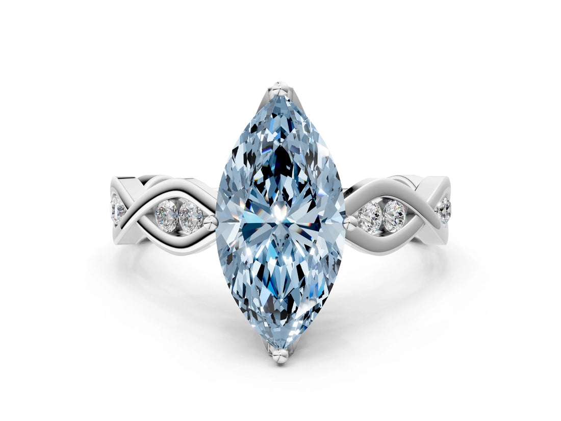 White gold Fancy Blue Marquise  Solitaire Twist Band with Leaf Prong Setting
