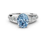 White gold Fancy Blue Oval  Brilliant Solitaire with Side Stones on a Pave Band and Four-Prong Setting_24