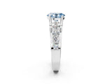 White gold Fancy Blue Oval  Brilliant Solitaire with Side Stones on a Pave Band and Four-Prong Setting_26