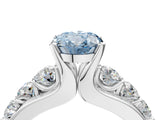 White gold Fancy Blue Oval  Brilliant Solitaire with Side Stones on a Pave Band and Four-Prong Setting_65