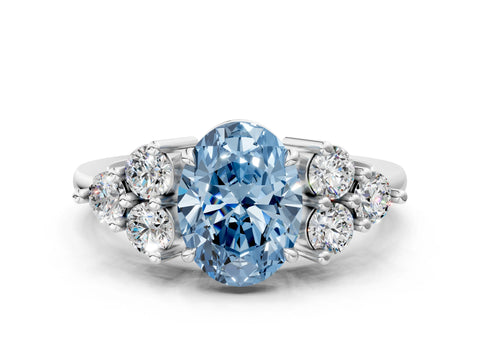 White gold Fancy Blue Oval Cut Brilliant Diamond Cluster Accent Solitaire Ring with Prong Setting