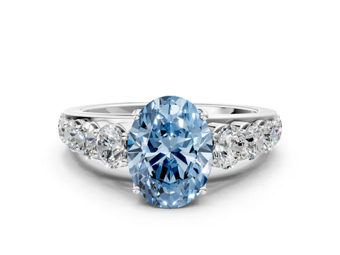 White gold Fancy Blue Oval Cut Brilliant Diamond Pavé Band with Six-Prong Setting