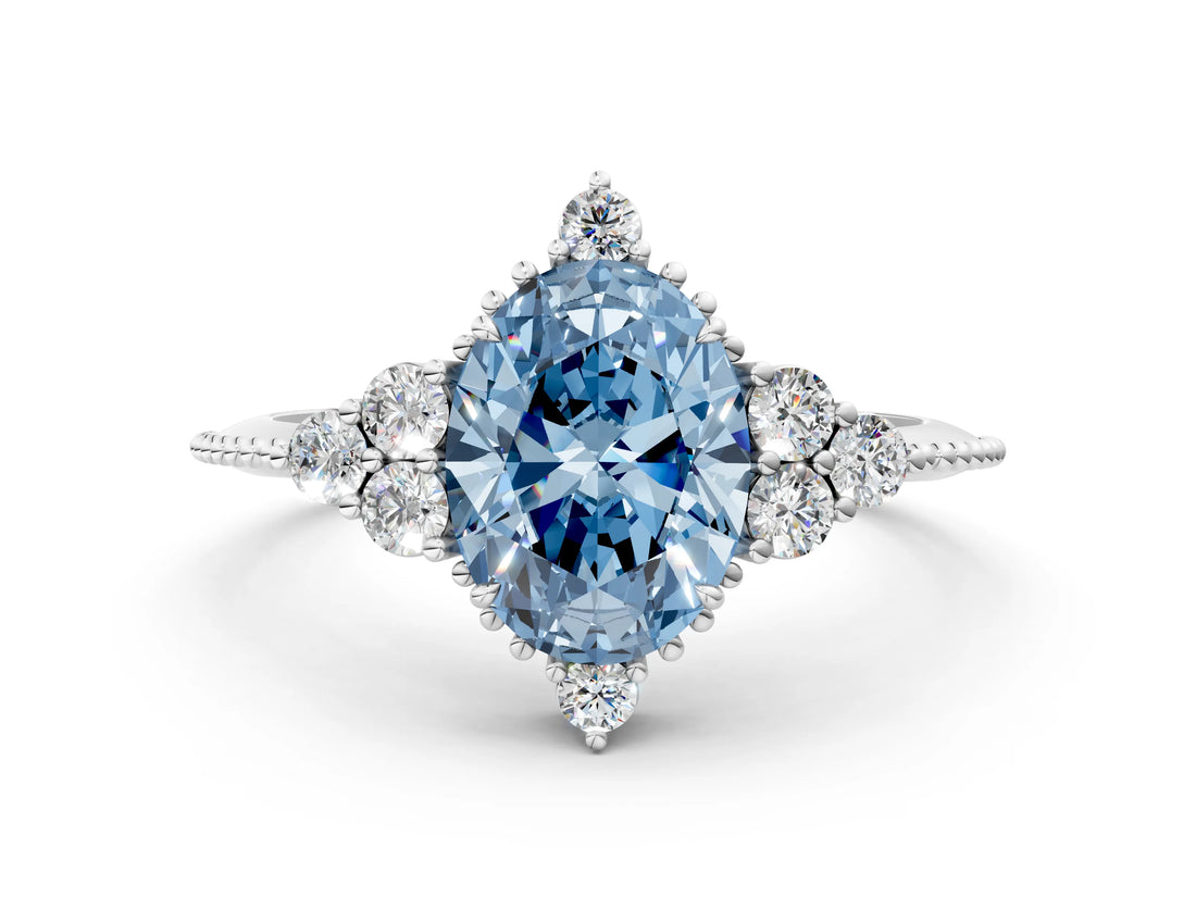 White gold Fancy Blue Oval Cut Brilliant Diamond with Cluster Setting on a Beaded Band and Four-Prong Setting_12