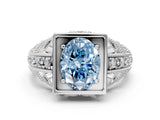 White gold Fancy Blue Oval Cut Brilliant Milgrain Filigree Diamond Ring with Square Prong Setting