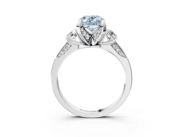 White gold Fancy Blue Oval Cut Brilliant Three-Stone Diamond Ring with Pavé Band and Four-Prong Setting