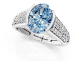 White gold Fancy Blue Oval Cut Cut Diamond Channel Set Pave Band with Tension Prong Setting_1