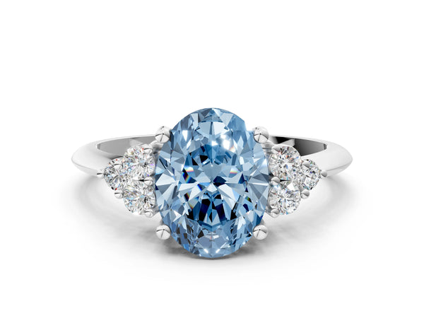 White gold Fancy Blue Oval Cut Cut Diamond Cluster Ring with Solitaire Band and Four-Prong Setting