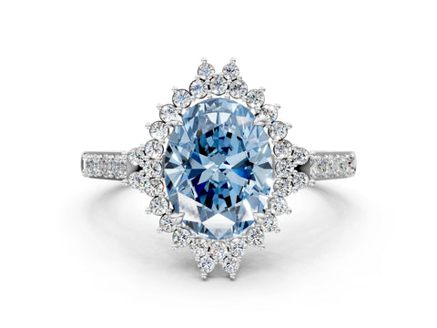White gold Fancy Blue Oval Cut Cut Diamond Sunburst Halo Engagement Ring with Pavé Band