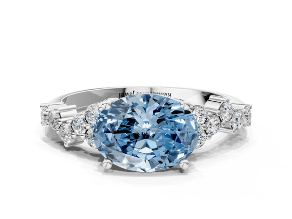 White gold Fancy Blue Oval Cut Diamond Cluster Pavé Band with Four-Prong Setting