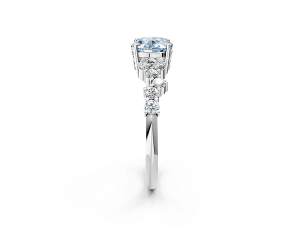 White gold Fancy Blue Oval Cut Diamond Cluster Pavé Band with Four-Prong Setting