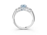 White gold Fancy Blue Oval  Cut Diamond Cluster Ring with Round Accent Stones and Prong Setting on a Classic Band_52