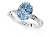 White gold Fancy Blue Oval Cut Diamond Engagement Ring with Side Stone Accents and Four-Prong Setting_13