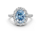 White gold Fancy Blue Oval Cut Diamond Floral Halo Ring with Pavé Band and Prong Setting_7