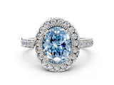 White gold Fancy Blue Oval Cut Diamond Halo Ring with Pavé Band and Prong Setting_12