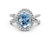 White gold Fancy Blue Oval Cut Diamond Halo Ring with Split Shank Pavé Band and Prong Setting_78