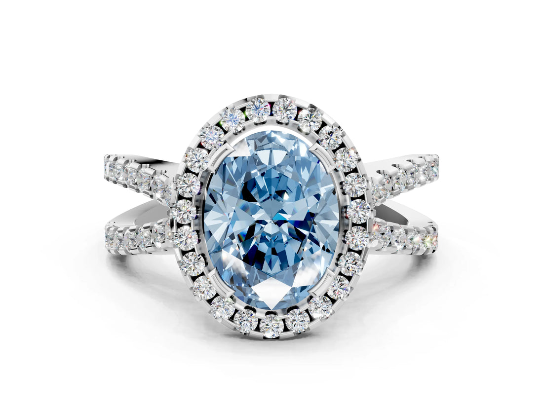 White gold Fancy Blue Oval Cut Diamond Halo Ring with Split Shank Pavé Band and Prong Setting_79