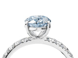 White gold Fancy Blue Oval Cut Diamond Pavé Solitaire Ring with Round Band and Prong Setting_46