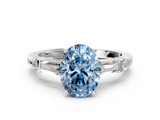White gold Fancy Blue Oval  Cut Diamond Ring with Baguette Side Stones, Channel Set Band, and Four-Prong Setting_3