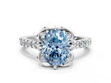 White gold Fancy Blue Oval Cut Diamond Ring with Pavé Band and Floral Prong Setting_39