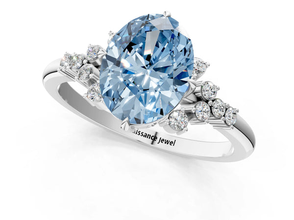 White gold Fancy Blue Oval Cut Diamond Ring with Side Stones and Four-Prong Setting