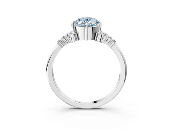 White gold Fancy Blue Oval Cut Diamond Ring with Side Stones and Four-Prong Setting