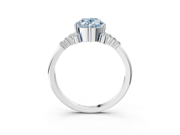 White gold Fancy Blue Oval Cut Diamond Ring with Side Stones and Four-Prong Setting
