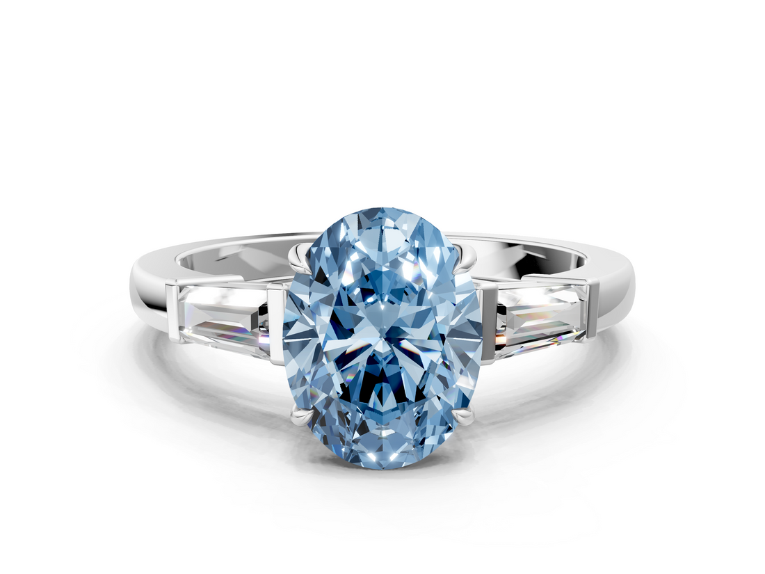 White gold Fancy Blue Oval  Cut Diamond Ring with Tapered Baguette Side Stones in Four-Prong Setting_3