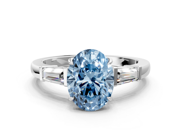 White gold Fancy Blue Oval  Cut Diamond Ring with Tapered Baguette Side Stones in Four-Prong Setting