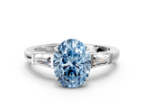 White gold Fancy Blue Oval  Cut Diamond Ring with Tapered Baguette Side Stones in Four-Prong Setting_3