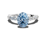 White gold Fancy Blue Oval Cut Diamond Side Stone Solitaire Ring with Round  and Four-Prong Setting_156