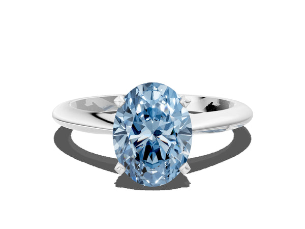 White gold Fancy Blue Oval Cut Diamond Solitaire Engagement Ring with Classic Band and Four-Prong Setting