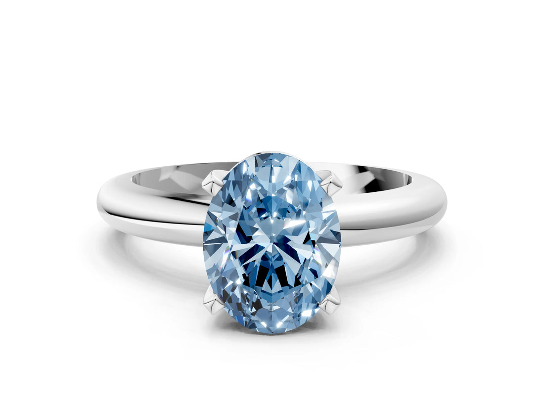 White gold Fancy Blue Oval Cut Diamond Solitaire Engagement Ring with Round Band and Four-Prong Setting_160