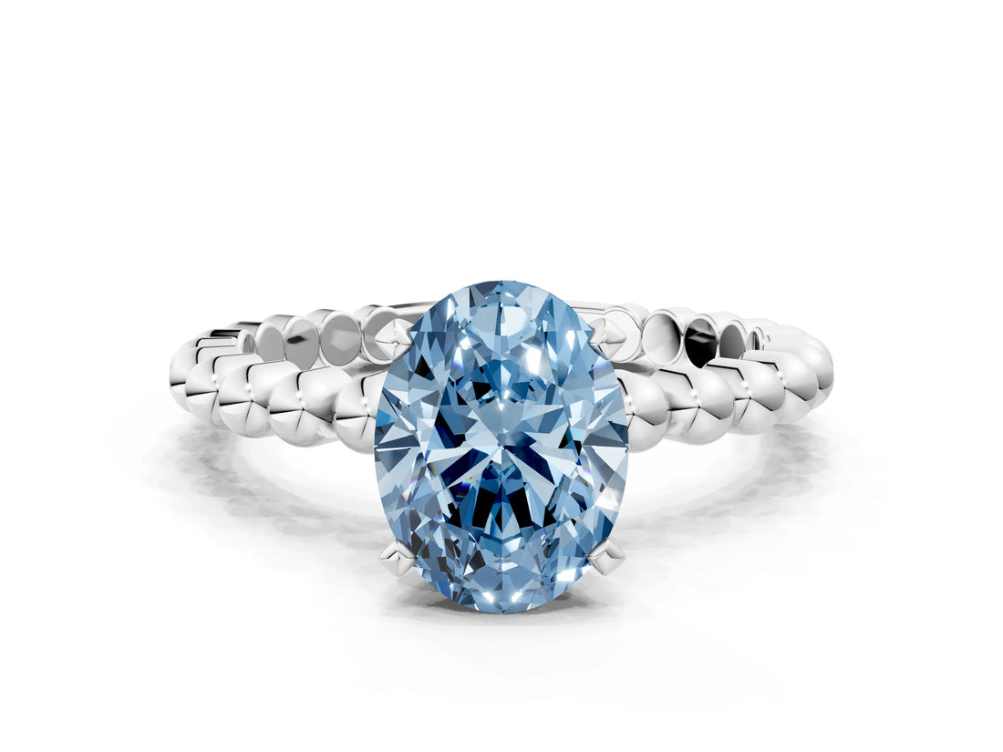 White gold Fancy Blue Oval Cut Diamond Solitaire Ring with Beaded Band and Prong Setting_367