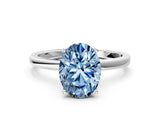 White gold Fancy Blue Oval Cut Diamond Solitaire Ring with Classic Band and Four-Prong Setting