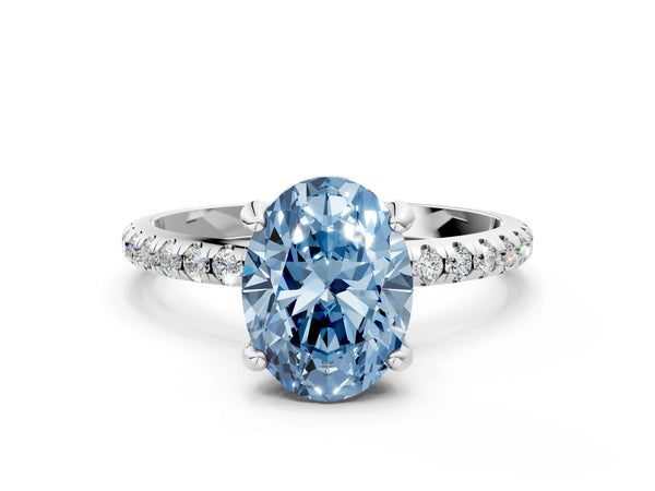 White gold Fancy Blue Oval Cut Diamond Solitaire Ring with Four-Prong Setting and Pavé Band