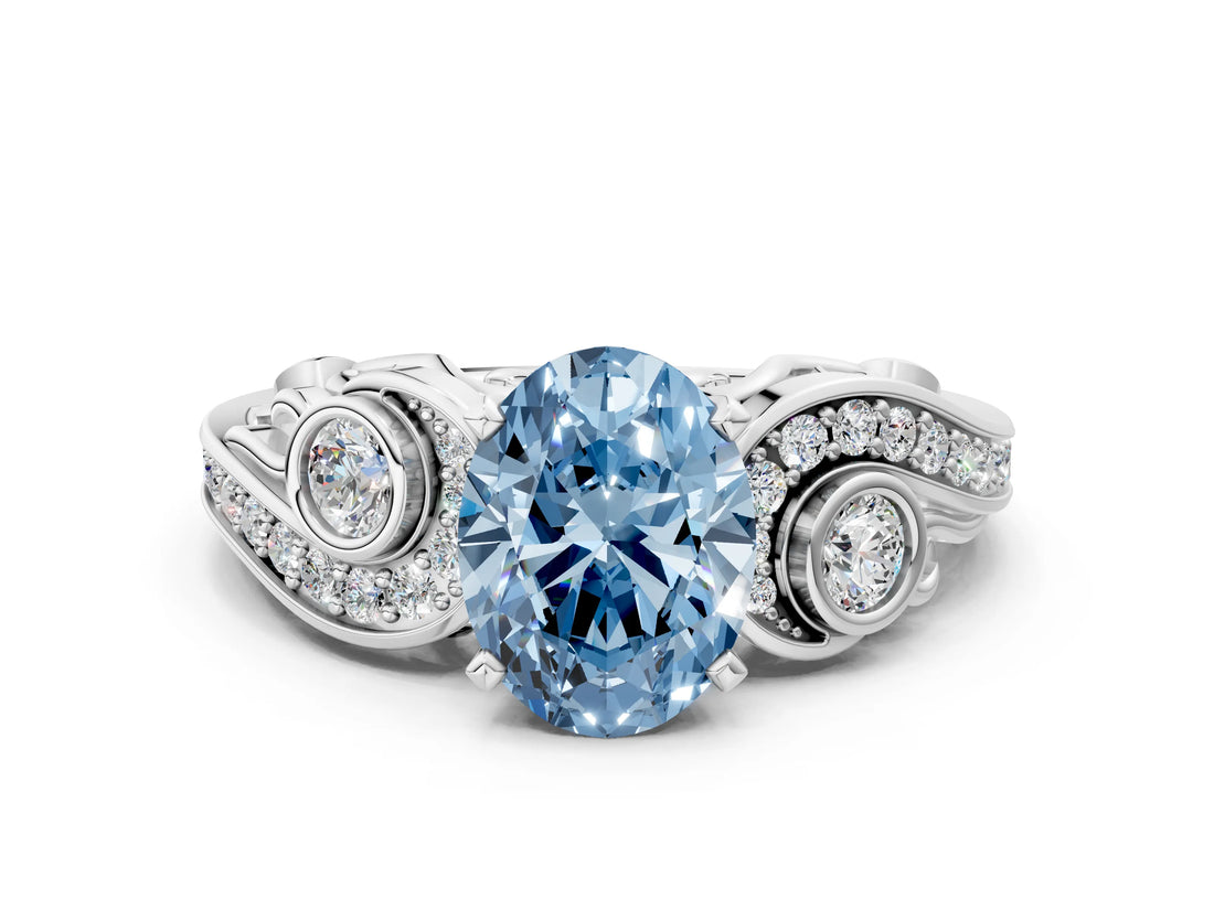 White gold Fancy Blue Oval Cut Diamond Solitaire Ring with Milgrain Pavé Band and Four-Prong Setting_247