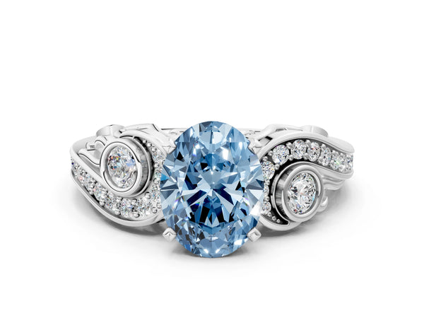 White gold Fancy Blue Oval Cut Diamond Solitaire Ring with Milgrain Pavé Band and Four-Prong Setting