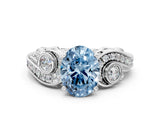 White gold Fancy Blue Oval Cut Diamond Solitaire Ring with Milgrain Pavé Band and Four-Prong Setting_249