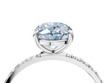 White gold Fancy Blue Oval Cut Diamond Solitaire Ring with Round  Pavé Band and Prong Setting_156