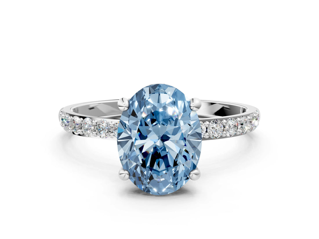 White gold Fancy Blue Oval Cut Diamond Solitaire Ring with Round  Pavé Band and Prong Setting_158