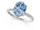 White gold Fancy Blue Oval Cut Diamond Solitaire Ring with Round  Pavé Band and Prong Setting_159