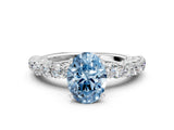 White gold Fancy Blue Oval Cut Diamond Solitaire Ring with Shared Prong Pavé Band and Four-Prong Setting_70