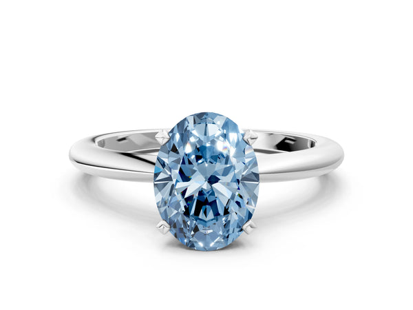 White gold Fancy Blue Oval Cut Diamond Solitaire Ring with Six-Prong Setting and Classic Band