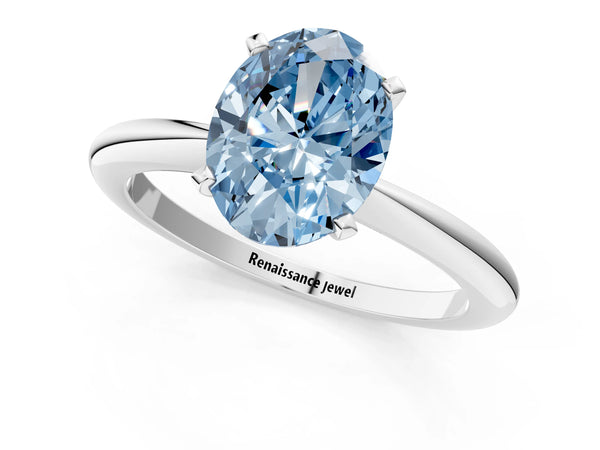 White gold Fancy Blue Oval Cut Diamond Solitaire Ring with Six-Prong Setting and Classic Band